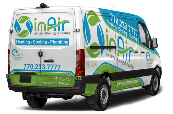 InAir service van with company logo and contact details, offering reliable heating and air services, as well as plumbing expertise.